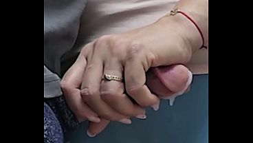 She stroke his cock until he cums hard